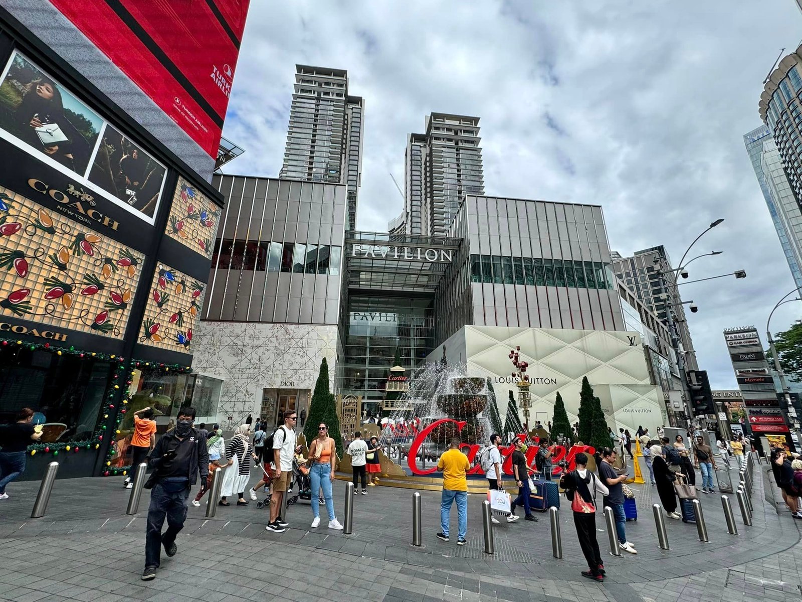 Street life outside Pavilion Kuala Lumpur in Bukit Bintang